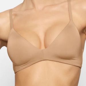 SKIMS WIRELESS FORM T-SHIRT DEMI BRA In Color Ochre